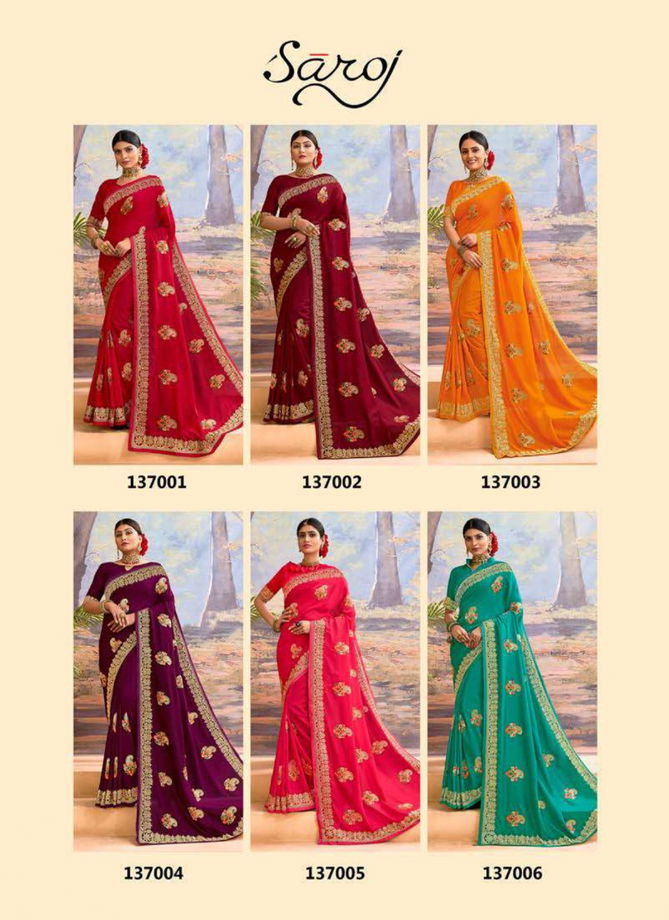 SAROJ KANGANA Fancy Festive Wear Heavy Designer Vichitra Silk With Embroidery Work On Border And Butta Saree Collection